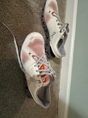 On Running Men's Athletic Shoes — White and Orange Accent